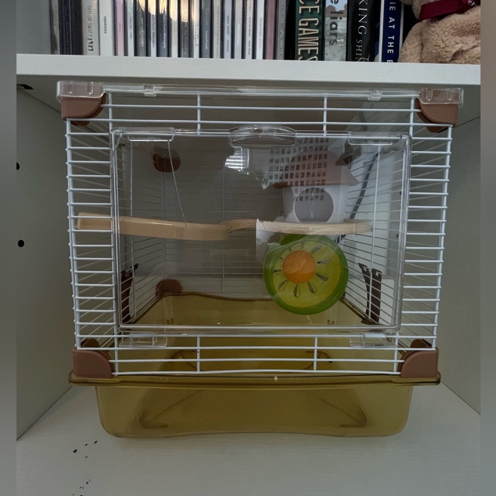 Small pet hamster cage with accessories